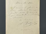 un bout de papier sur lequel figure une écriture manuscrite