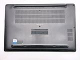 a laptop that is sitting on a white surface