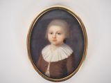 portrait of a young boy in a brown jacket and white collared shirt