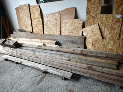 many pieces of wood stacked on top of each other