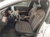a picture of the inside of a car with a steering wheel