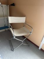 Chaise en tube chromé et cuir blanc. (photo 2)