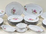 a picture of a collection of china plates and bowls