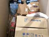 a cardboard box filled with various items in it
