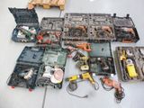 a lot of tools that are laying out on the floor
