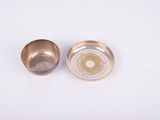 pair of silver plated ashtrays on a white background