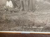 an old photo of a group of men standing next to each other