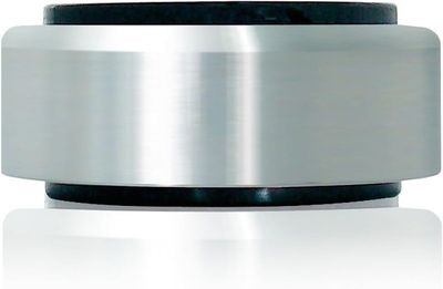 a close up of a metal object on a white surface