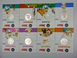 six different coin sets of various cartoon characters on a white surface