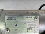 a close up of a motor that is on a white surface