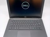 the dell laptop is open and ready to be used