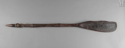 an image of a wooden spoon with a metal handle