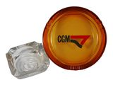 a glass ashtray with a logo on it and a glass ashtray with a logo on it