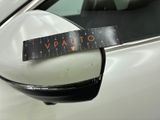 a sticker on the side mirror of a car that says vauto