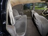 a view of the inside of a car from the driver ' s seat