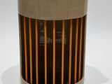 an image of a wooden and glass container with a blue ball on top