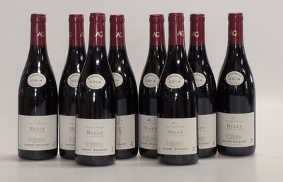 six bottles of red wine are lined up in a row