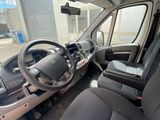 the interior of a vehicle with a steering wheel and a dashboard