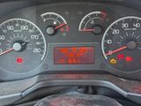 a close up of a car dashboard with various gauges and numbers