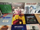 a lot of records on a table with a lot of them