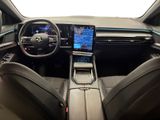 the interior of a car with a steering wheel, dashboard, and display screen