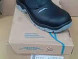 a shoe that is on top of a box