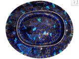 a glass bowl with a blue and green design on it