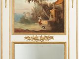 a painting on the wall above a mirror in a room