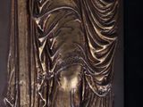 statue of a woman holding a baby in her arms