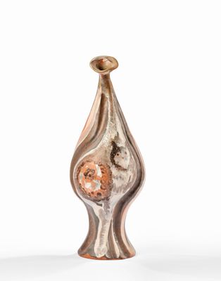 an image of a bronze vase on a white background