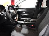 a car with a steering wheel and a dash board