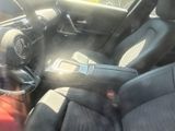 a picture of a car interior with a steering wheel