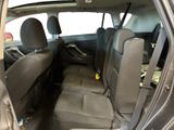 the back seats of a car are empty and the passenger seat is empty