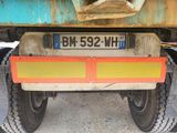 a close up of a truck with a license plate on it