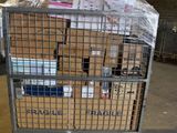 a large metal cart with many boxes on top of it