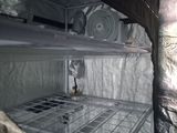 an image of a refrigerator that is covered in plastic