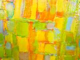 peinture abstraite représentant des carrés jaunes, verts et bleus sur fond blanc