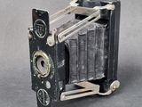 an old camera that is sitting on a table