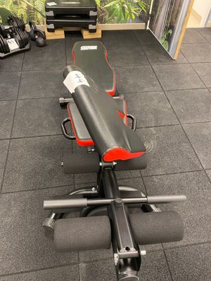 a view of a gym bench in the middle of a room