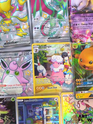 a lot of pokemon cards that are on the table