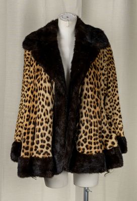 a picture of a leopard print coat on a mannequin