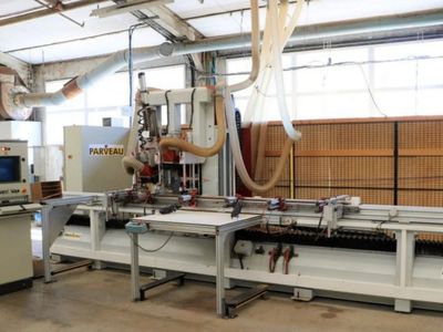 une photo d'un atelier d'usinage où se trouvent de nombreuses machines