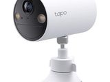 a close up of a camera on a stand with a white background