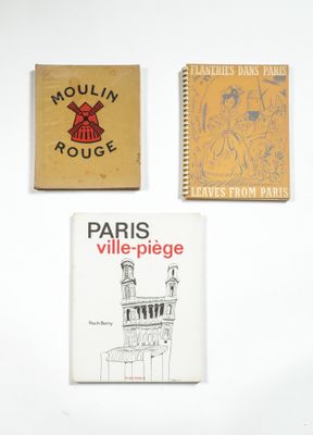 three books sitting on top of a white table next to each other