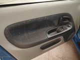 a picture of a car door handle with a hole in it