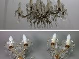 two pictures of a chandelier with a lot of lights hanging from it