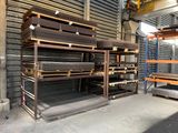 a large rack of metal items in a warehouse
