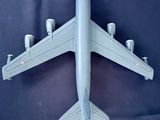 a model of an airplane on a blue background