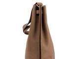 a brown leather handbag on a white background