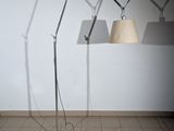two lamps that are on the floor next to each other